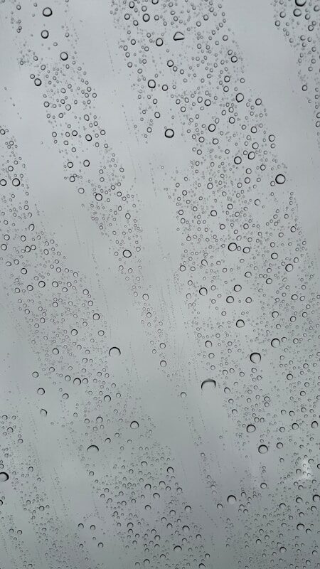 a window with raindrops on it
